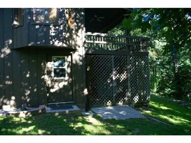 Exterior Back/Side. side access to golf cart storage