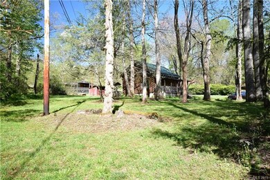 Photo from the back corner near the creek toward the home