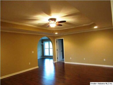 Living room with arched doorways