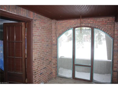 Screened in porch walks out to balcony