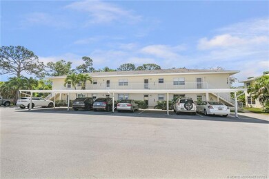 Condo Exterior and Covered Parking Area