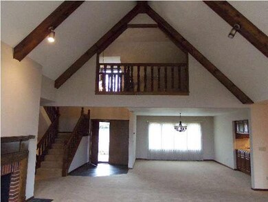 View of front entry and formal dining area