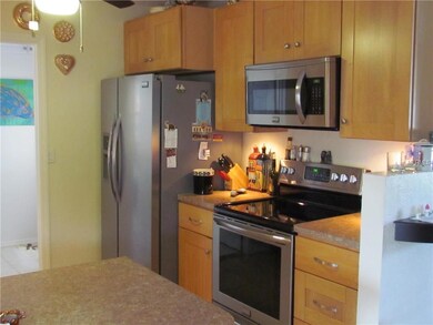 Kitchen Range Refrigerator Microwave