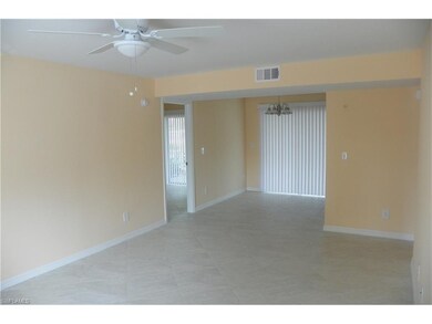 Living area with all new flooring, paint, and acce