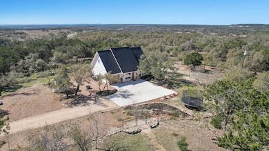Drone / aerial view featuring a view of trees
