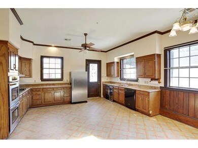 Kitchen. The kitchen is filled with sunshine and h