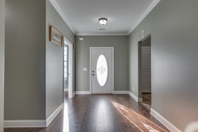 Entry- Engineered Hardwood Throughout! Tile in Baths