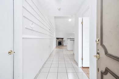Upon entering are tile floors and high ceilings.