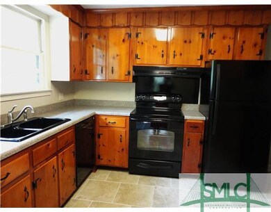 Kitchen. New tiled floors, new countertops, new st