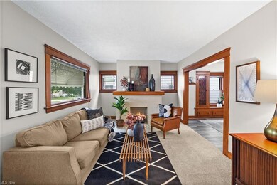 Living room with wood-type flooring
