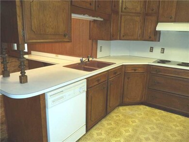 Kitchen View 2. Kitchen w/ breakfast bar open to d