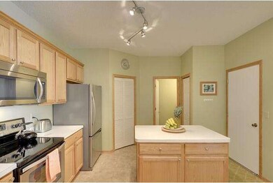 The kitchen is spacious with stainless steel appli