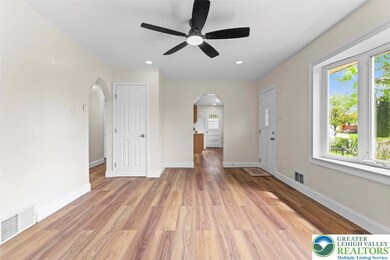 Living room - new laminate flooring, new lighting,