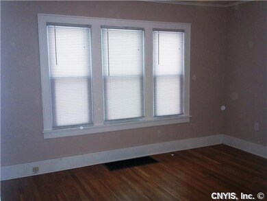 Living Room. New windows, new paint and refinished