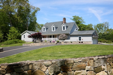 Hundreds of feet of professionally installed stone walls and two grand stone pillars, creates a setting that would suit a much higher price range.