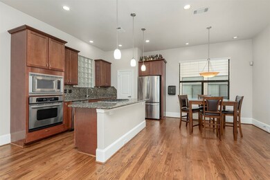 Sleek, modern kitchen featuring stainless steel ap