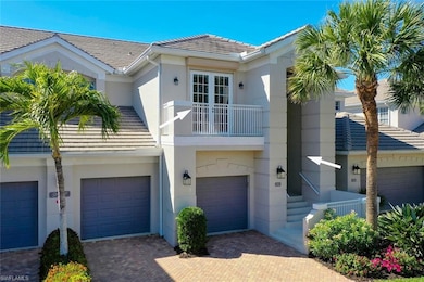 Cypress Hammock Condo exterior featuring 2 car gar