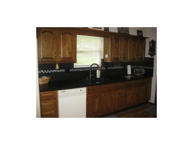 Kitchen updated with Granite Transformations, new 