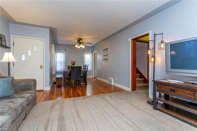 Living area view to dining room and upstairs