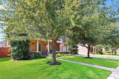 Another view of the front of the home with a nice walk way up to the front door.