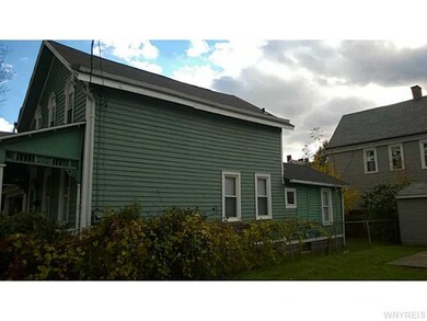 Other. Side view of house.