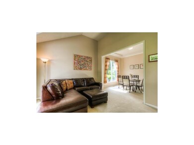 Formal living room connected to formal dining