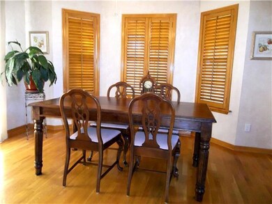 Wood shutters, ample space for a big table.