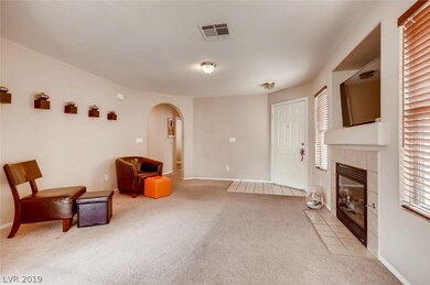 Open layout with natural light, fireplace and open