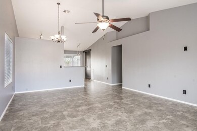 Front Room looking to Kitchen and Dining