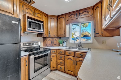 Window over the sink provides natural light