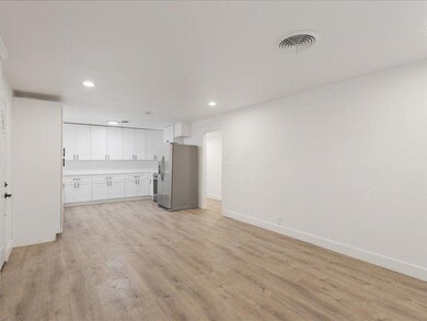 Unfurnished living room with light wood-type flooring