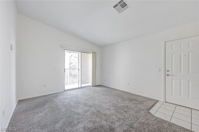 LIVING ROOM WITH SLIDER TO BALCONY