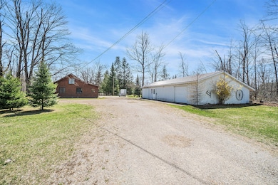 267 W Thumb Lake Rd, Vanderbilt, MI 49795 - photo 2