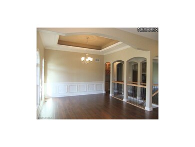 The formal dining room features quality details in
