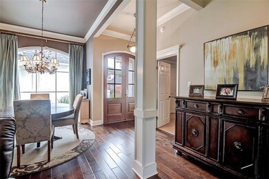 Formal dining area with a beautiful chandelier wit