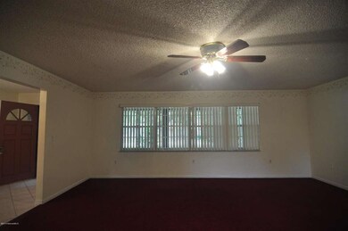 Living room to foyer