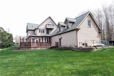 View of deck and rear of garage