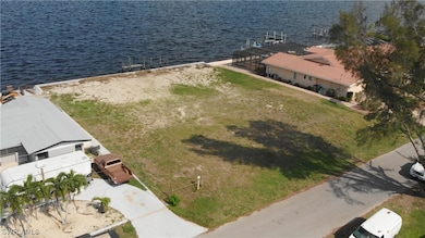 Aerial view of property and surrounding area with