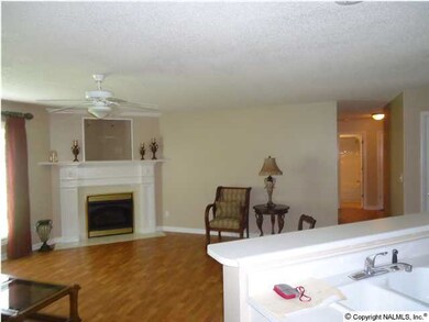 View of Great Room with gas log fireplace.