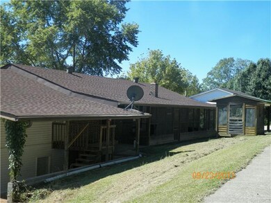 REAR VIEW WITH SCREENED IN PORCH