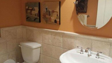 Main floor powder room for the convenience of fami