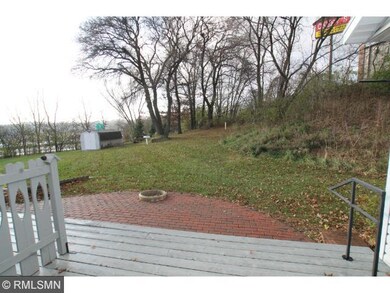 This unit has a back deck and a shared fire pit.