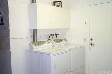 SEPARATE LAUNDRY AREA IN GARAGE