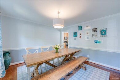 Formal dining off entry way with chair and crown m