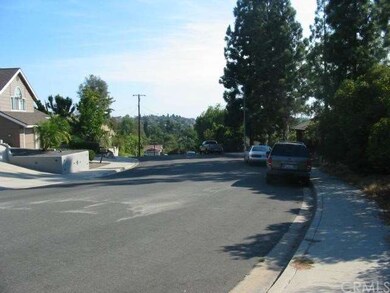 VIEW OF GLEN ST. FROM DRIVEWAY TO STREET 