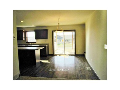 Dining Area. Picture is of Similar Unit.