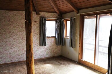 Bedroom With Access To Deck