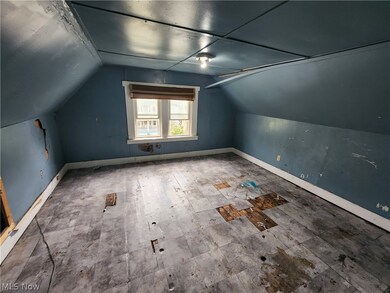 Bonus room featuring lofted ceiling