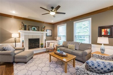 Crown molding and wainscoting are lovely details.