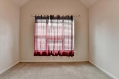 Empty room with baseboards, a wealth of natural li